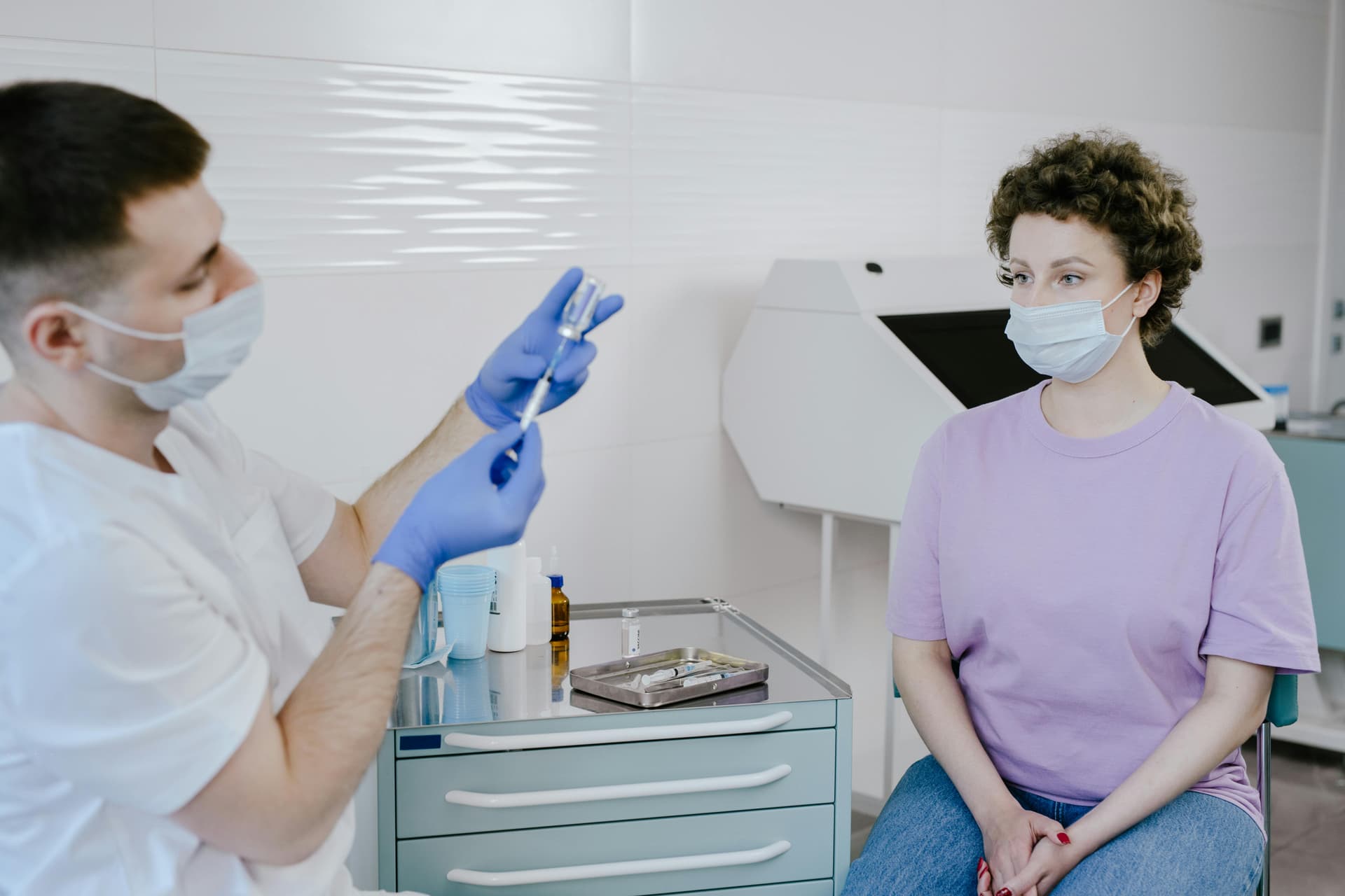 Healthcare worker administering vaccine